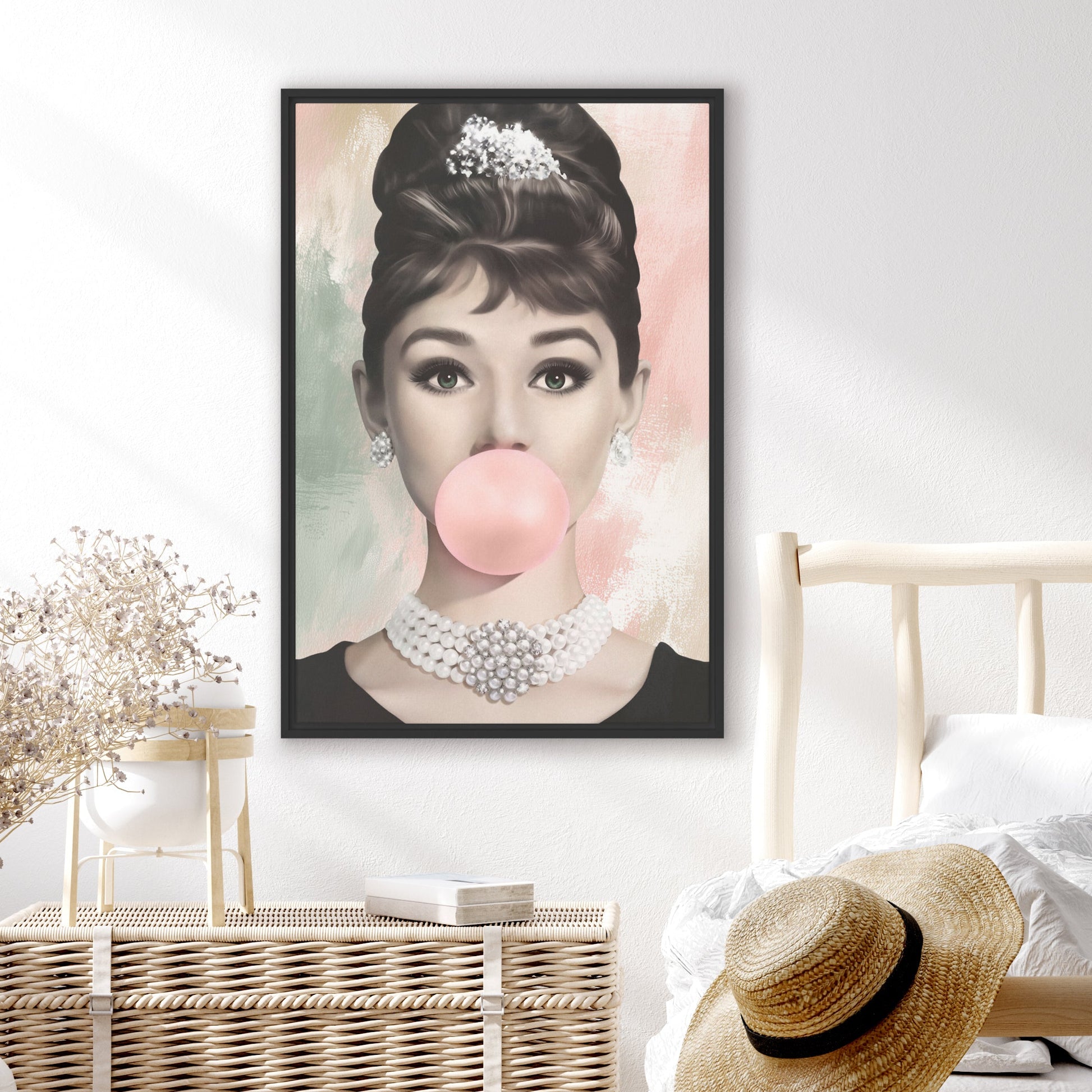 Framed abstract pop culture artwork of Audrey Hepburn with a pink bubble gum in a bedroom setting.