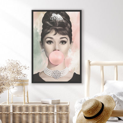 Framed abstract pop culture artwork of Audrey Hepburn with a pink bubble gum in a bedroom setting.