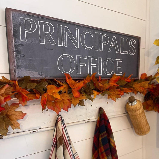 canvas sign that is designed to look like an old cracked chalkboard. It reads Principal&#39;s Office