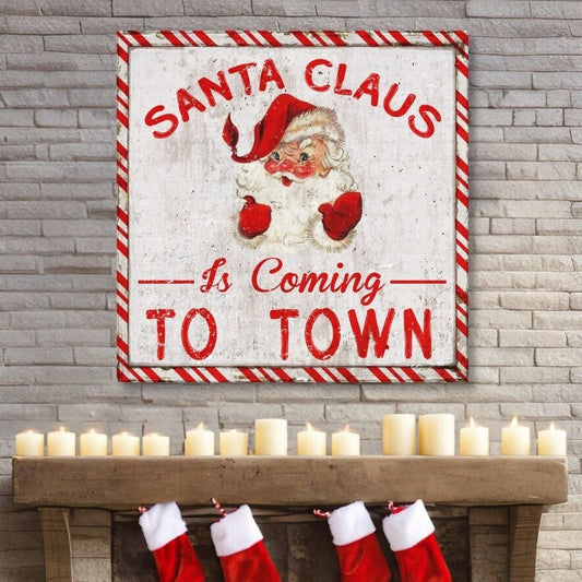 santa claus is coming to town canvas sign with a cute retro santa and a faux peppermint frame