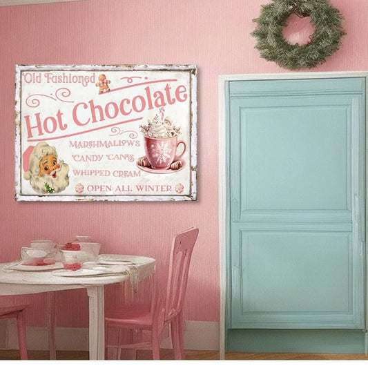pink and white canvas sign that says Old Fashioned Hot Chocolate. Features a pink retro santa, a gingerbread man and a cup of hot chocolate