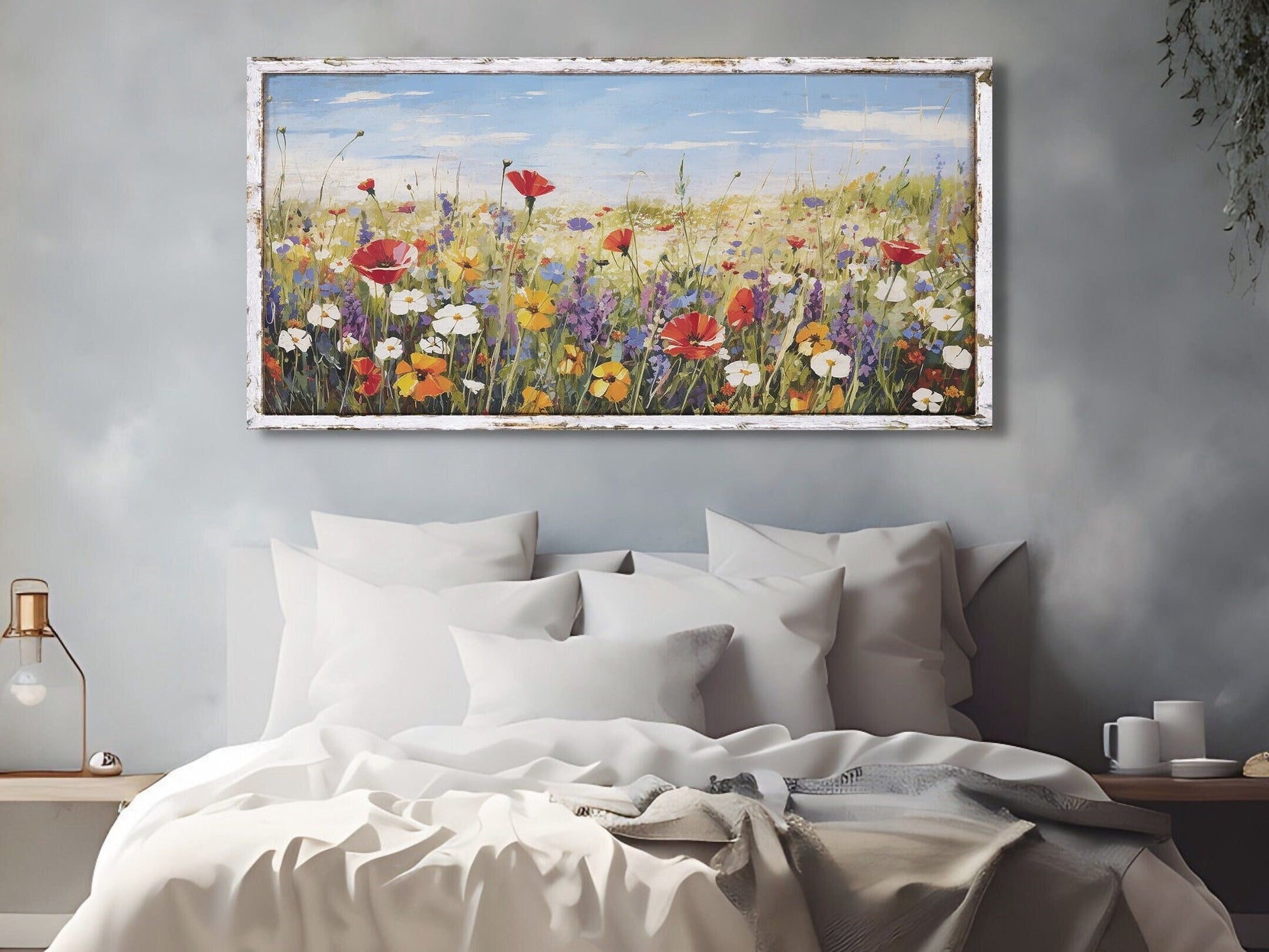 canvas wall art featuring a field of vibrant wildflowers and a faux wooden frame