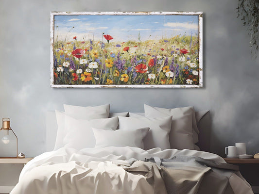 canvas wall art featuring a field of vibrant wildflowers and a faux wooden frame